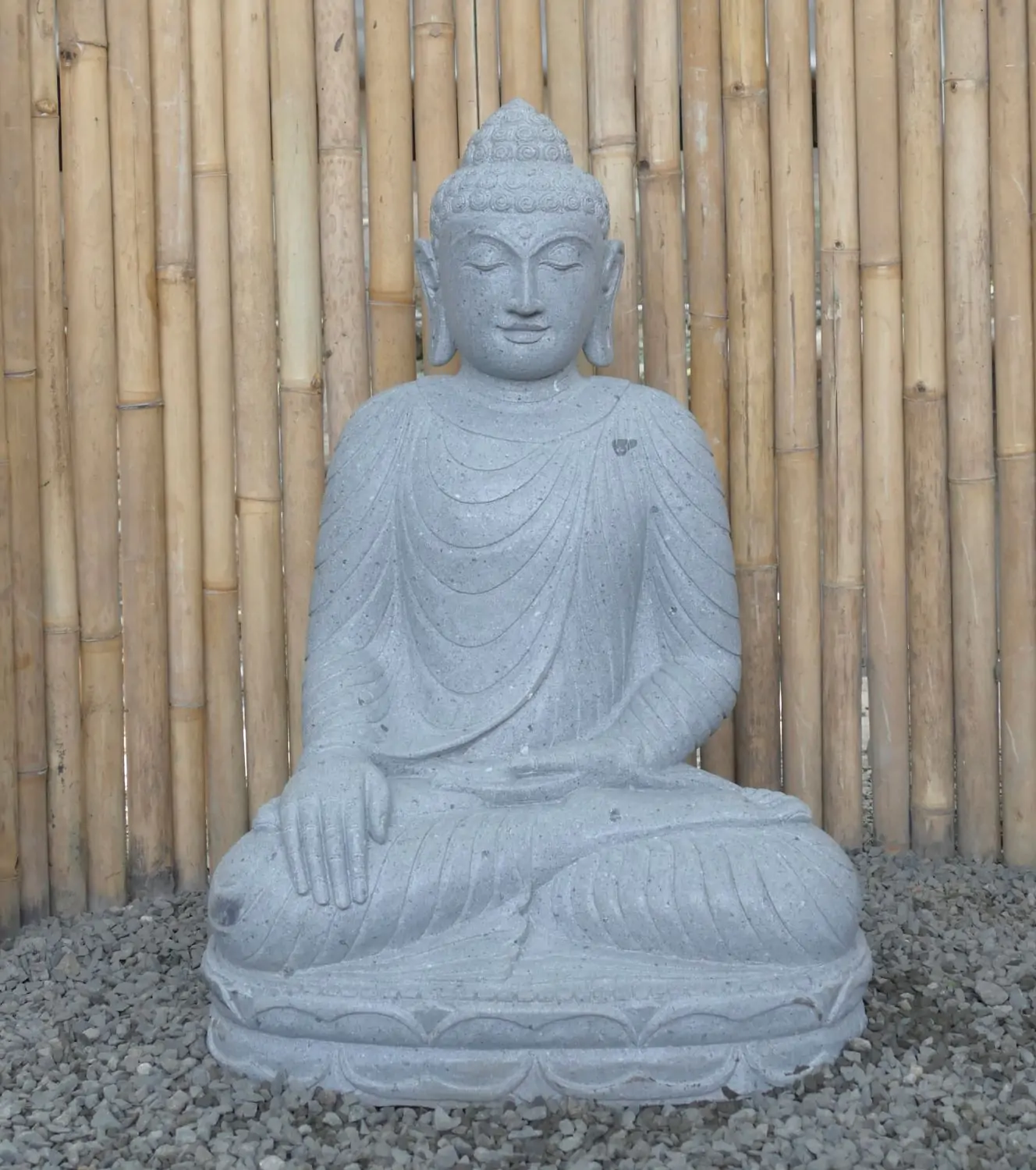  Product image 1 of the product “Seated Buddha made of Riverstone in Bhumisparsha - gesture of touching the earth. 89cm height. ”